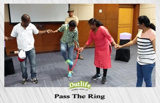 Pass the ring team building activity
